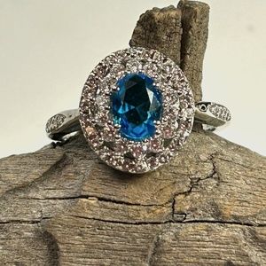 Sterling silver Swiss blue double halo with white topaz ring